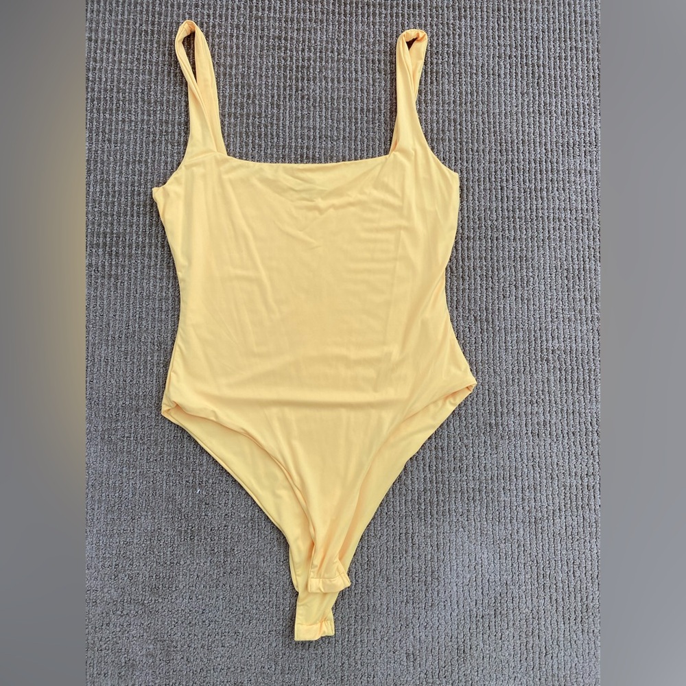 SHEIN yellow body suit never worn